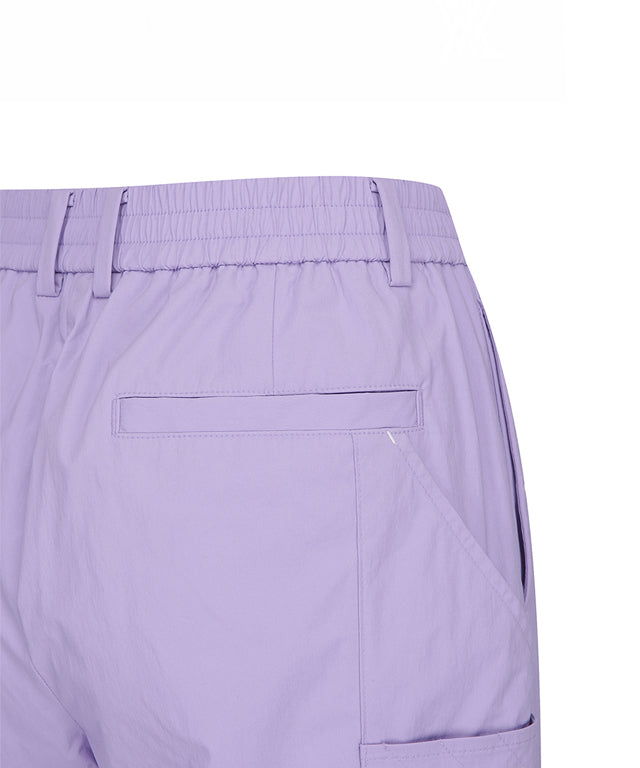 Lavender ANEW Golf Women Ventilation Slim Jogger Long Pants showcasing stylish design and comfortable fit.